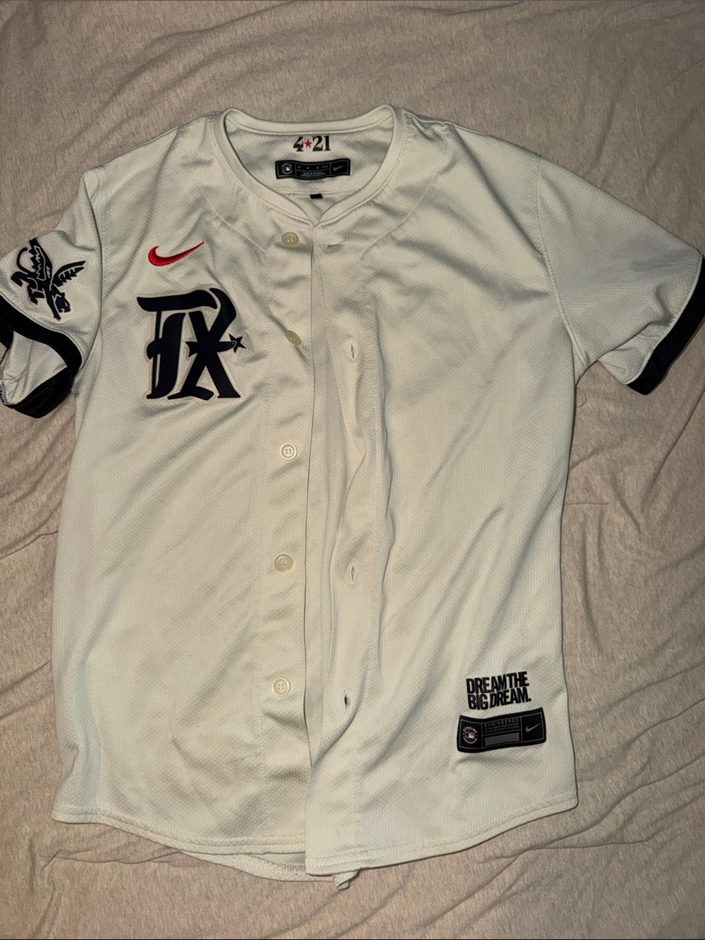 Nike Cream TX Rangers Jersey with Black TX Logo and Red Swoosh